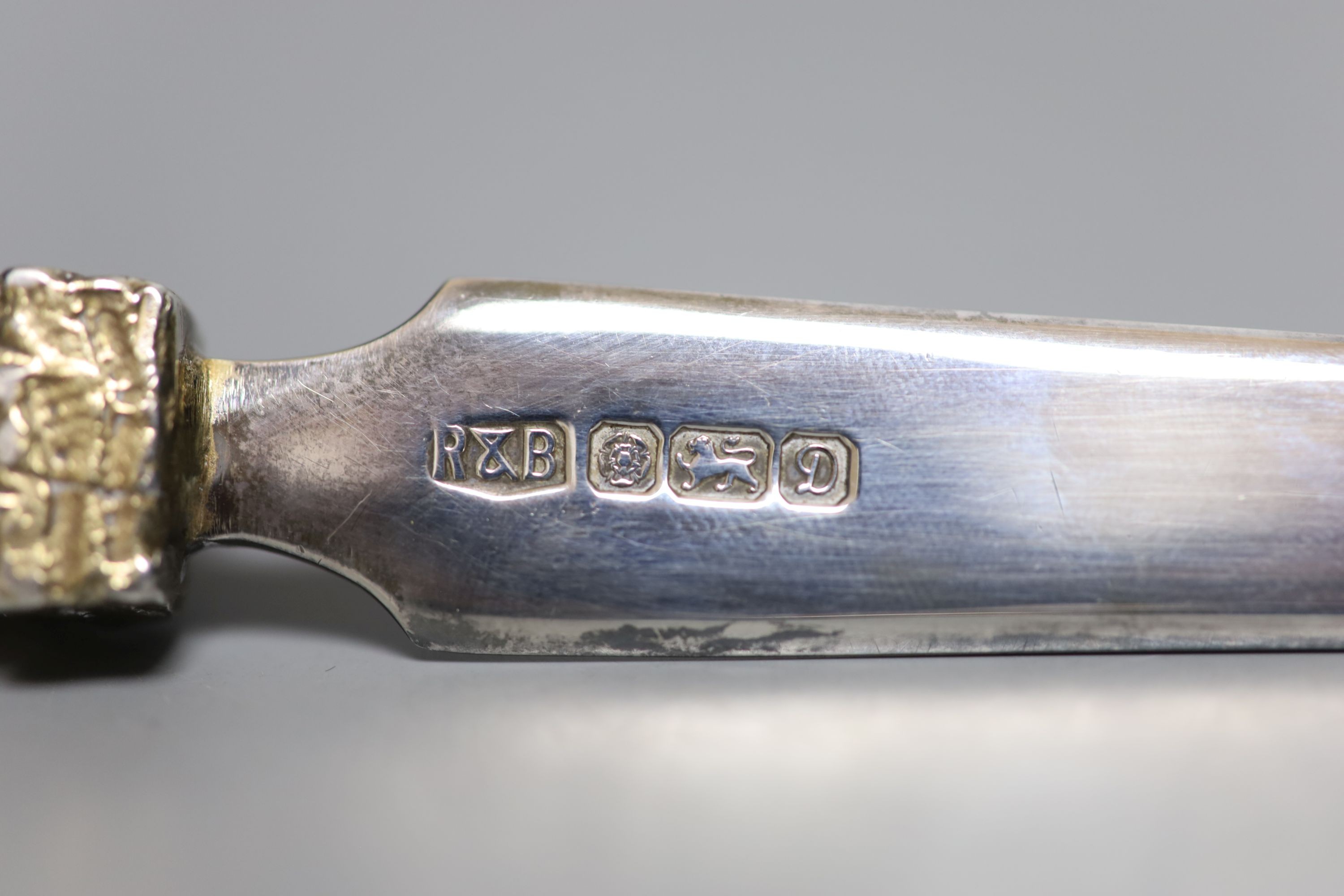 A modern parcel gilt silver letter opener, with eagle terminal, Roberts & Belk, Sheffield, 1978, 20.5cm.